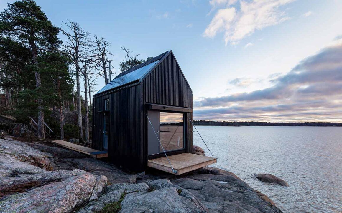 cabane écologique en Finlande au bord d'un lac