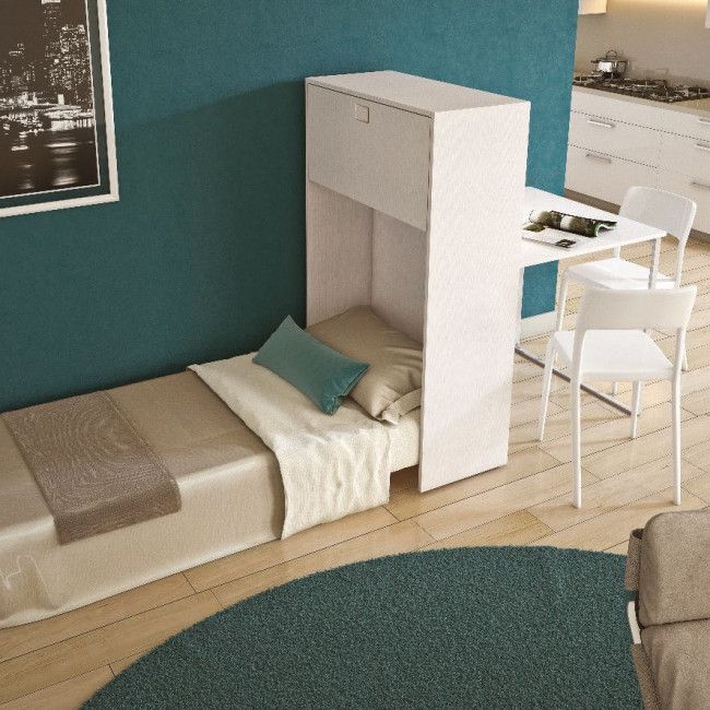 Night'n Day 493 est un meuble avec une table intégrée qui se transforme en un lit simple pratique.