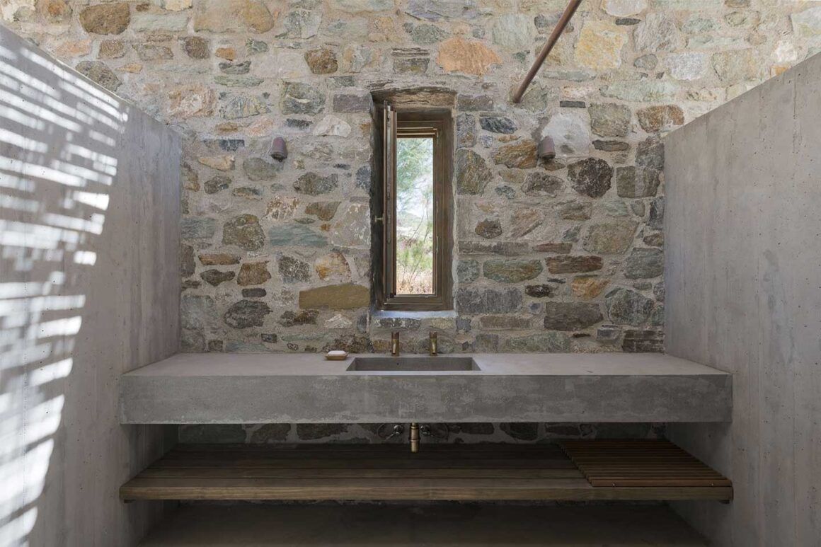 salle de bain en béton et pierre