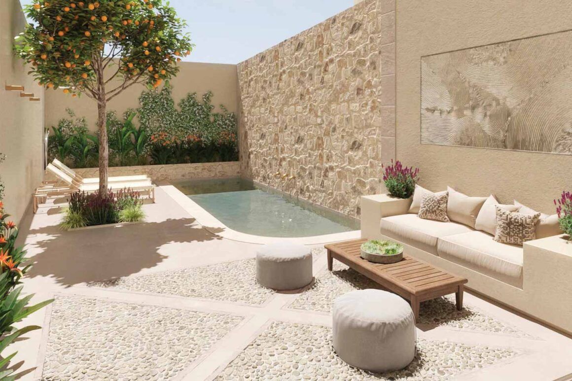 cour en pierre avec petite piscine