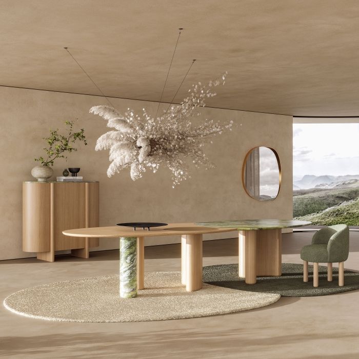 Table sculpturale avec détail de l'union de deux plateaux en chêne naturel et marbre vert irlandais