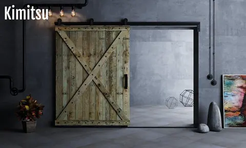 Coût pose porte coulissante bois massif 2026 : tarifs détaillés main-d’œuvre incluse