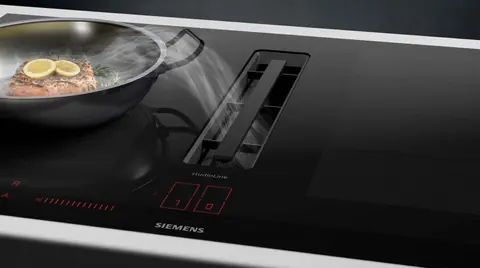 De la conception à la pratique : l'évolution de la plaque de cuisson à induction avec hotte intégrée